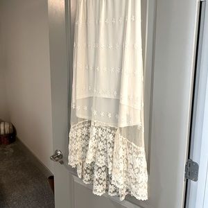 Cream colored.Size Womens M ,lace outer ,wedding, elastic band waist skirt